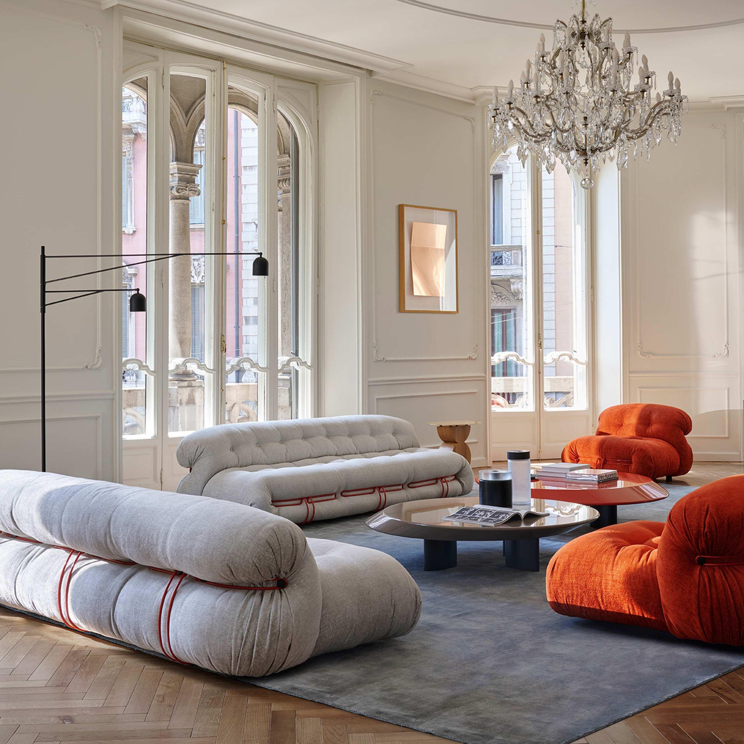 The Soriana sofa by Afra and Tobia Scarpa in a Milan interior, soft upholstery held by a chrome clamp