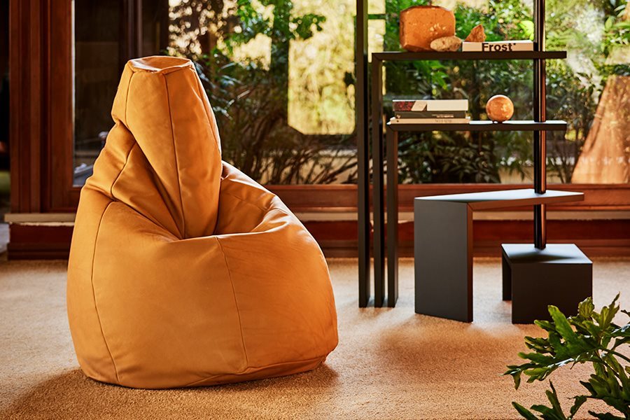 A tan leather Sacco beanbag by Zanotta in a 1970s interior