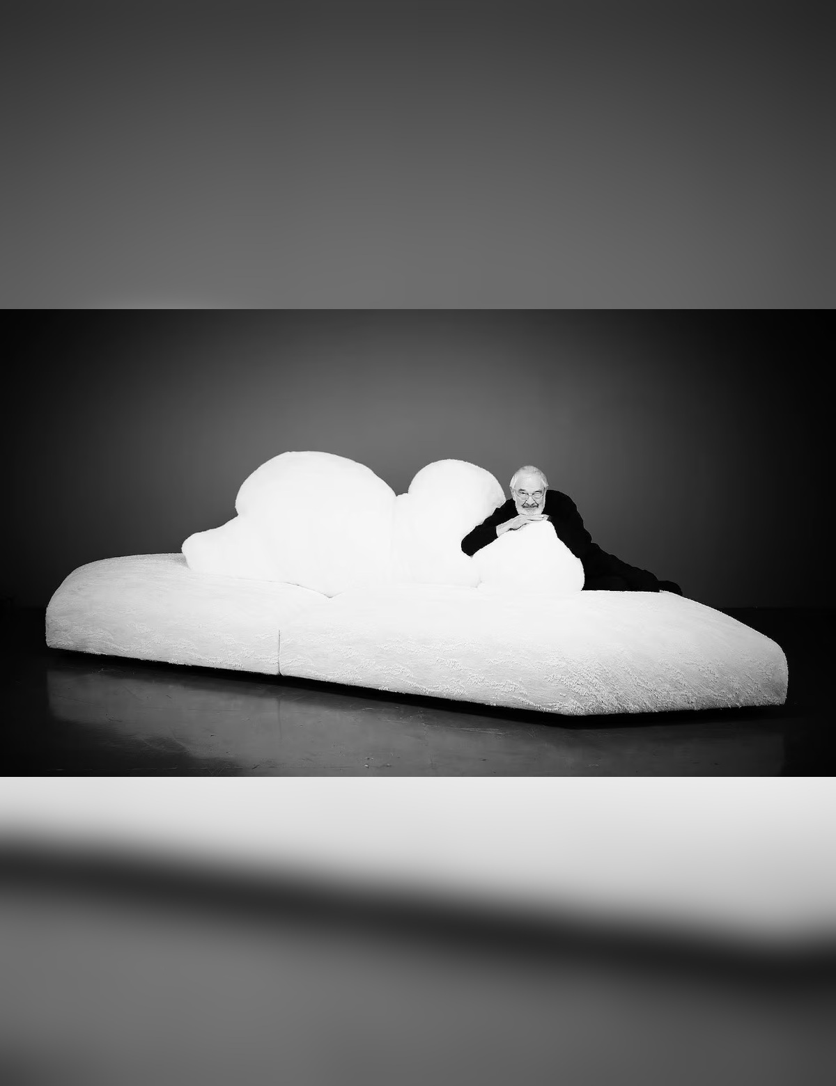 A black-and-white portrait and sculptural seating composition. AI-generated image for illustration purposes.