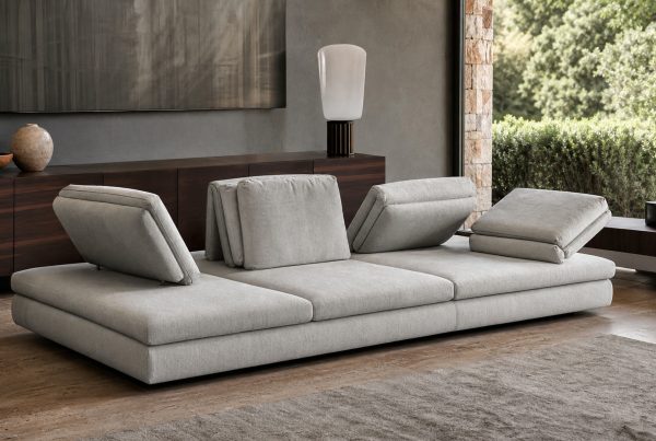 Low modular seating with repositioned back cushions. AI-generated image for illustration purposes.