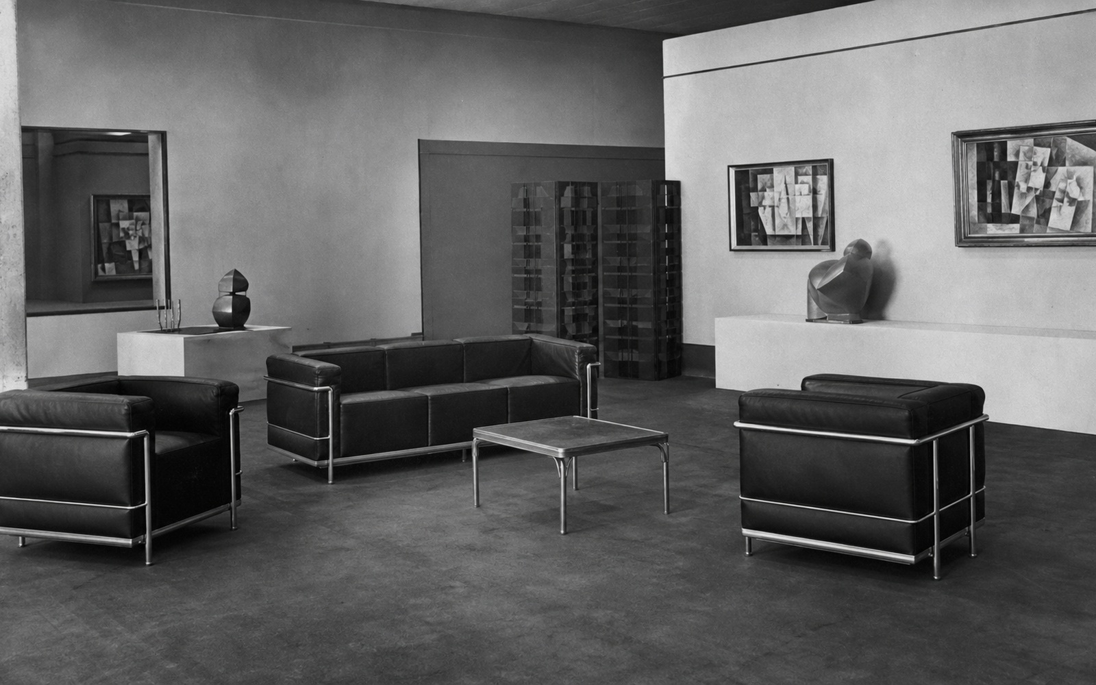Steel-framed leather seating in a modernist interior. AI-generated image for illustration purposes.