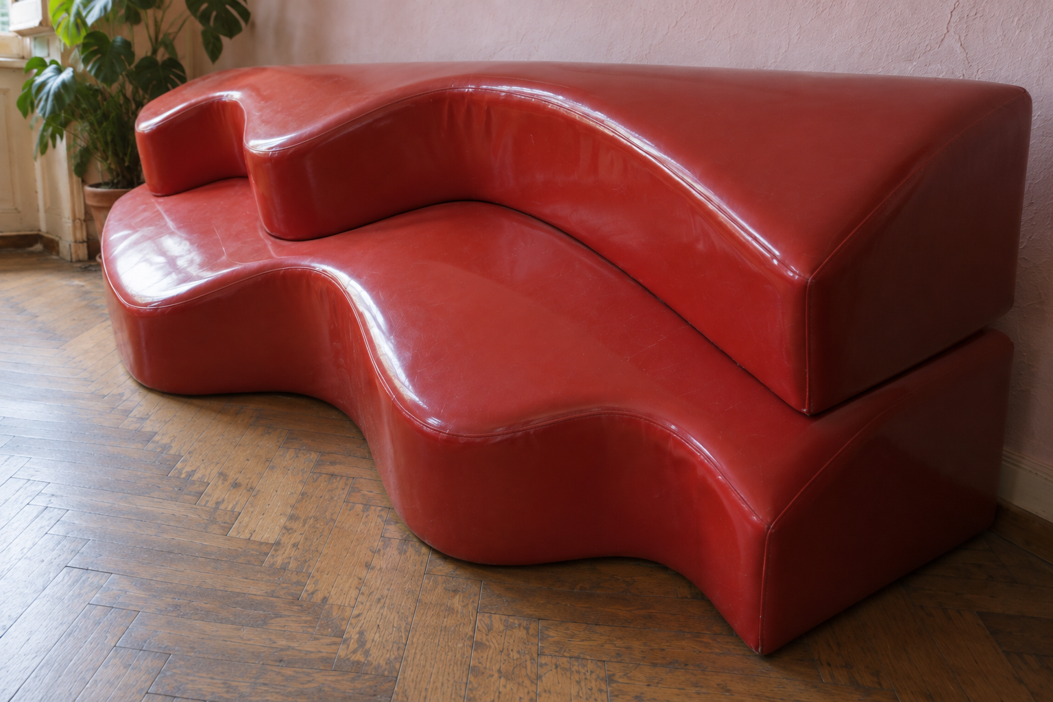 The curved junction of two red Superonda elements
