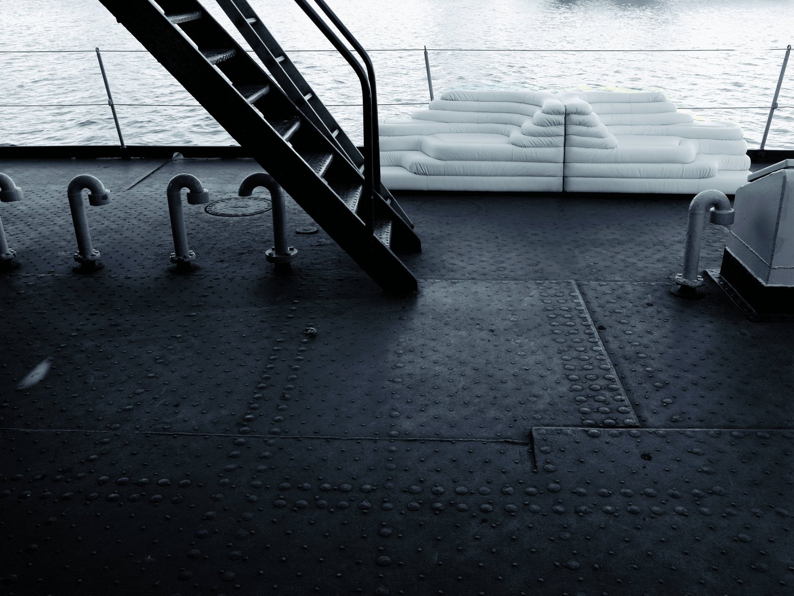 White de Sede Terrazza sofa photographed on an industrial waterfront deck
