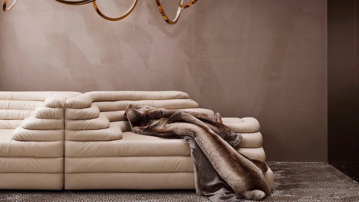 Cream leather Terrazza sofa with visible curved tiers and seams in a Zinc Textile London interior